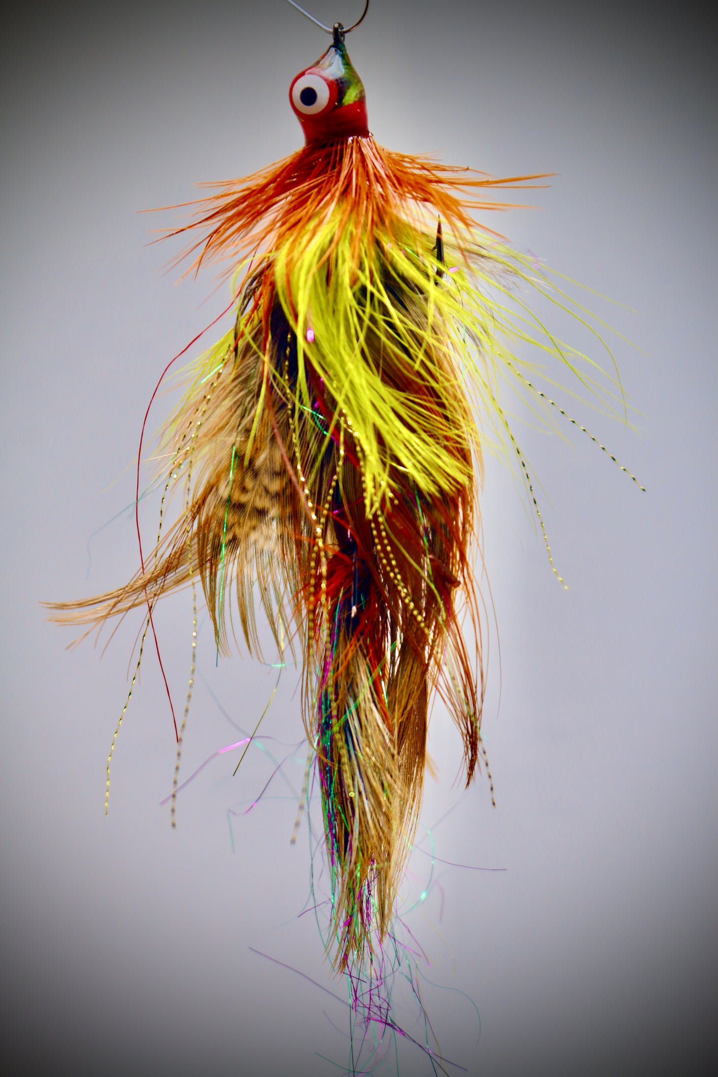 Multi-layered Ringneck pheasant with Rubber legs + Yellow & Orange Hackle Wrap + Disco Flash + Extra Weighted Body + Clear Rosin Casting